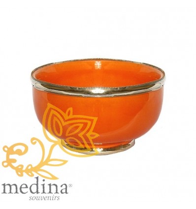 Künstlerische orange Schale mit rostfreier Metallumrandung